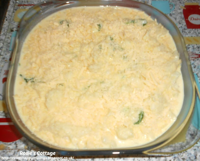 Delicious Cauliflower Cheese & Spinach - Perfect for a midweek treat! Once your lovely cauliflower cheese and spinach is in an oven proof dish, scatter the remaining grated cheese over the top and place into the oven..