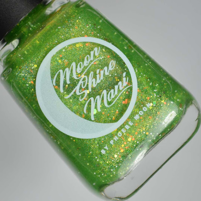 green nail polish with iridescent glitter