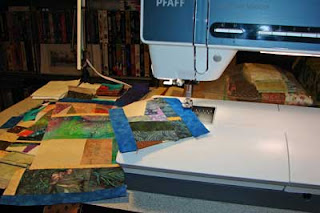 Here are some scraps being sewn into a crumb quilt.