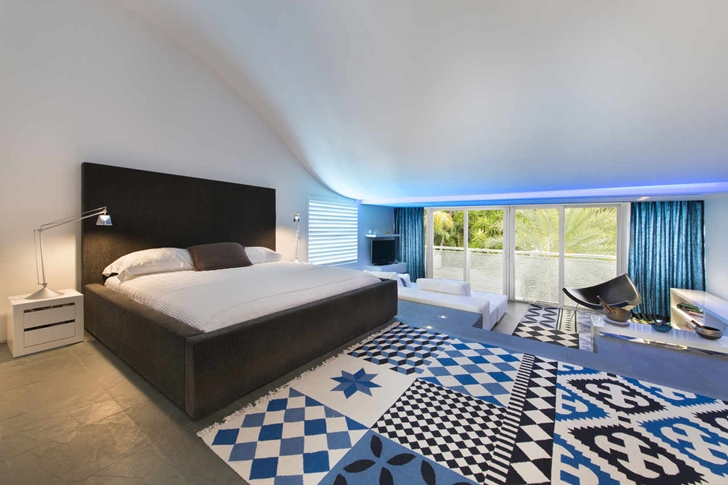 Bedroom with open curtains in Modern mansion in Miami