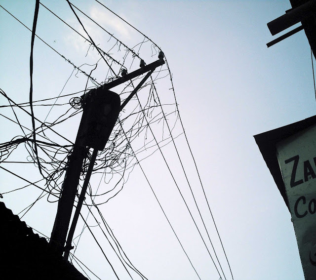 close-up of electric wires tampered with