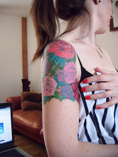 flowers tattoos on arm tattoos women