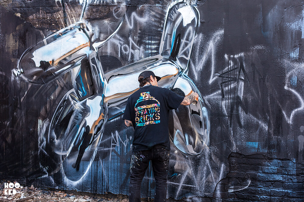 3D Chrome Balloon graffiti Dog by street artist Fanakapan painted in London