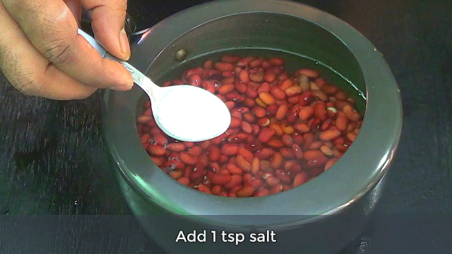 Add salt to rajma for boil image