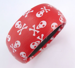 http://www.kcavintagegems.uk/chunky-red-and-white-skull-bangle-3747-p.asp