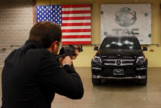 AMAZING!! Mercedes Benz CEO Sits In A Bullet Proof Car As They Shoot Gun At It (Watch Video)