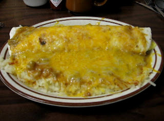 Click to enlarge - Big Breakfast Burrito – served with hash browns and covered with melted Cheddar and Jack cheeses.