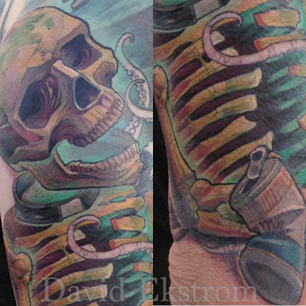 sunken skellington with beer can tattoo