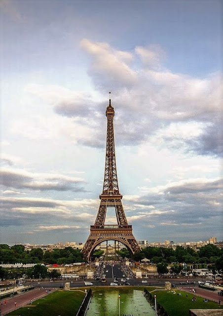 Eiffel Tower under a cloudy sky