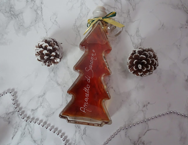 amaretto in a christmas tree shaped glass bottle 