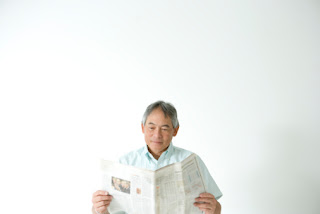 reading a newspaper