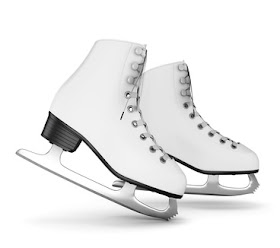 Pic of white, professional ice skating boots