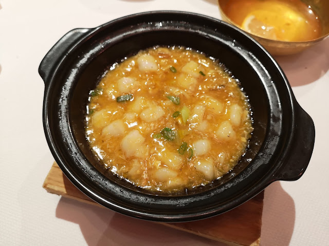 Steamed Korean Rice and Diced Cod with Hairy Crab Roe, served in a Claypot