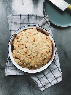 Onion pie crust side up in the oven dish