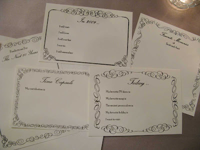  well as the scrolled framework for the cards that the guests filled out