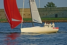 J/70 one-design sailboat- girls team sailing off Newport