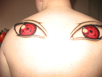 sharingan back tattoo