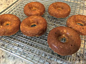 Doughnuts at weddings are so popular. Make your own with this Homemade Banana Doughnuts With Chocolate Shell Wedding Favors recipe from www.abrideonabudget.com.