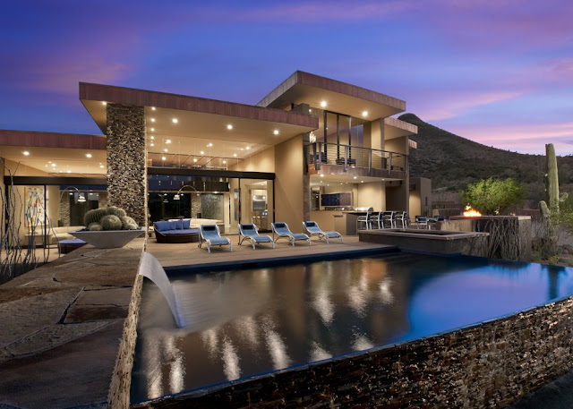 Swimming pool and modern desert house