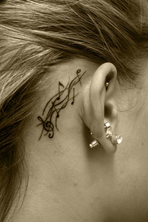 Creative music notes tattoos designs musical notes tattoo designs