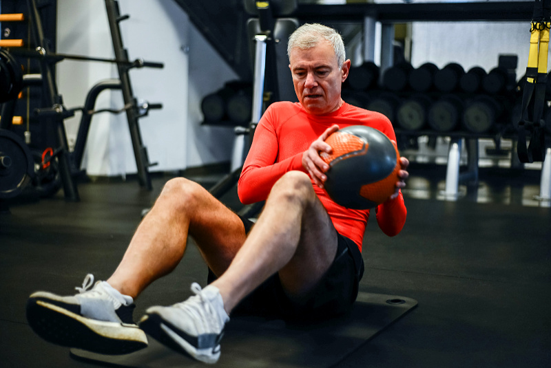 Man exercising at the gym