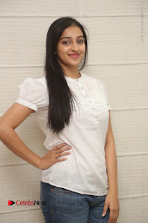 Tollywood Telugu Actress Mouryaani Latest Stills in Ripped Jeans at Intlo Deyyam Nakem Bhayam Movie Interview  0005.JPG