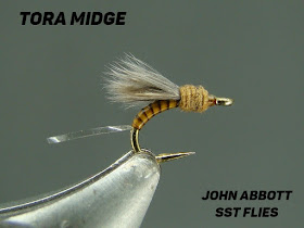 Tora Midge, Midge Emerger, Putah Creek, Body Quill, Stripped Peacock Herl, Partridge Feather. Super Fine Dubbing, TMC Hook, SST Flies, Midge Pattern