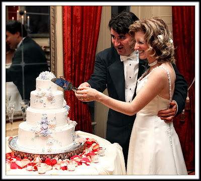 bride and groom cut the cakes