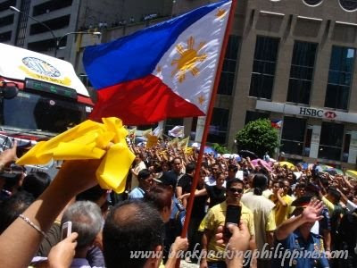 Cory's yellow ribbons in front of the Philippine national flag