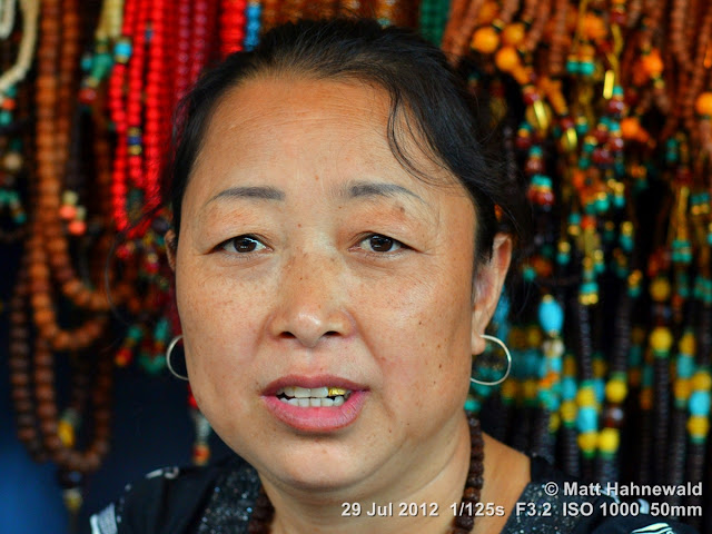 China, Panjiayuan Market, Beijing, people, street portrait, Chinese woman, saleslady