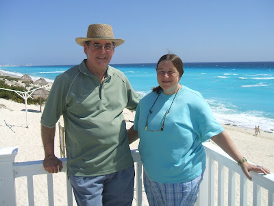 Nanci & Arthur overlooking beach in Cancun