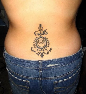 tattoos for ladies lower back. Zoe Saldana arabic tattoo