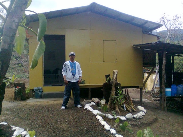 Foreman Gilbert posing at the existing shelter