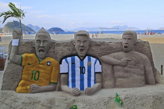 Creepy sand sculptures of Neymar, Messi & Ronaldo at Copacabana beach