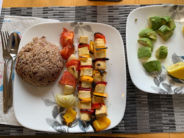 Tofu Kebab served with rice and avocado.