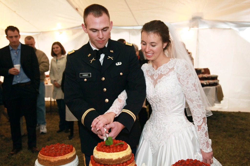 We entered the main tent and sliced the wedding cheesecake