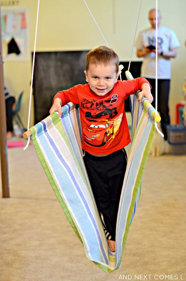 Swinging in a homemade sensory swing