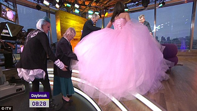 Adrian Chiles told TV viewers that his cohost had agreed to model the gown 