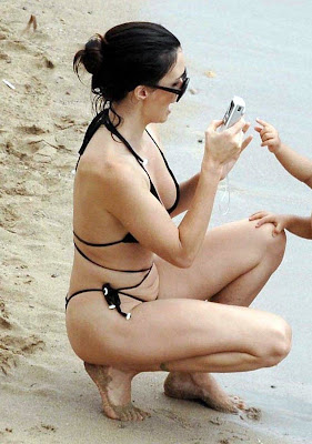 Actress Paz Vega in a black bikini