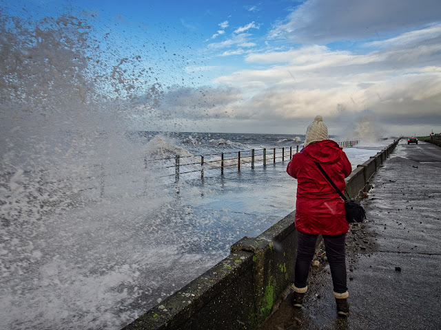 Photo of me photographing the rough sea on Maryport Promenade