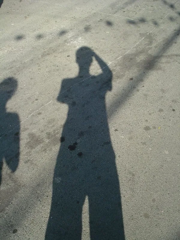 Being playful with my shadow during the La Loma Lechon Festival