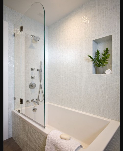 Bathroom Blue Wall Tile Designs Ideas with chrome shower head and rectangular soaking bathtub