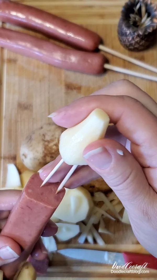 And two toothpicks into the potato for the nose cone of the rocket.