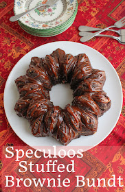 Food Lust People Love: Fudgy brownie batter is baked with a filling of cookie butter for a delicious sweet treat I’ve named speculoos stuffed brownie Bundt. It is super more-ish and disappears in a jiffy. Speculoos is also known as biscoff spread or cookie butter. It used to be quite a challenge to find in normal grocery stories but I bought my jar in Walmart of all places.