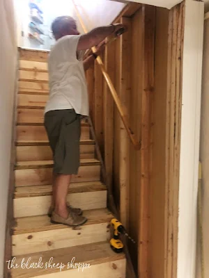 Preparing for drywall in stairwell.