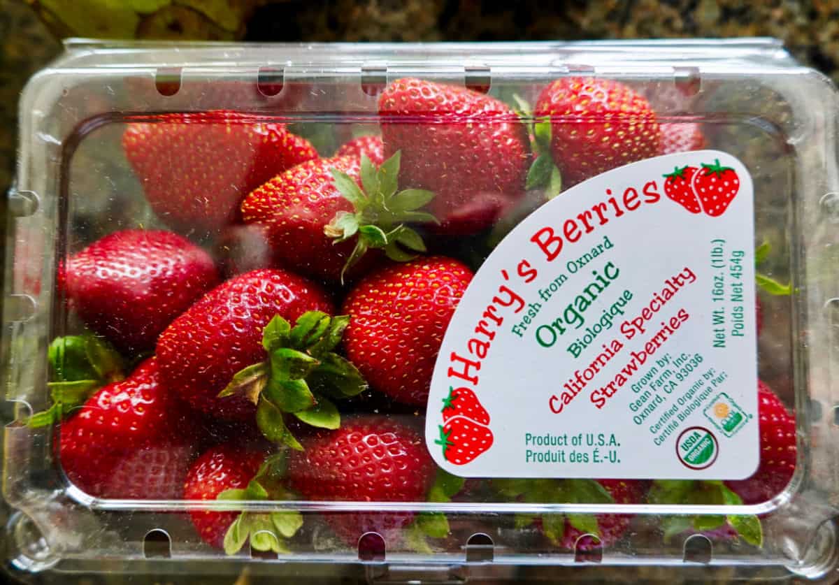 Container of fresh strawberries.