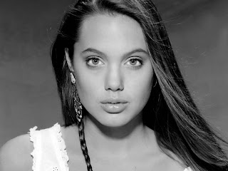 Free unwatermarked wallpapers of Angelina Jolie at Fullwalls.blogspot.com