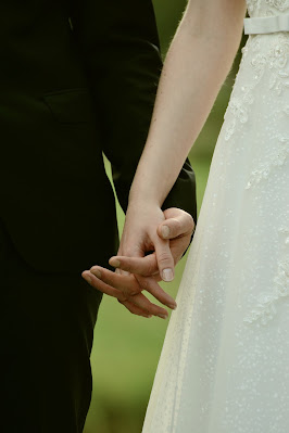 two people holding hands