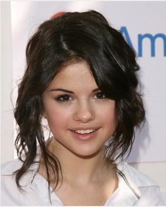 selena gomez short hair curled. selena gomez short curly hair.