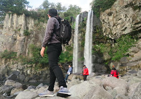 visit JeongBang Waterfalls in Jeju